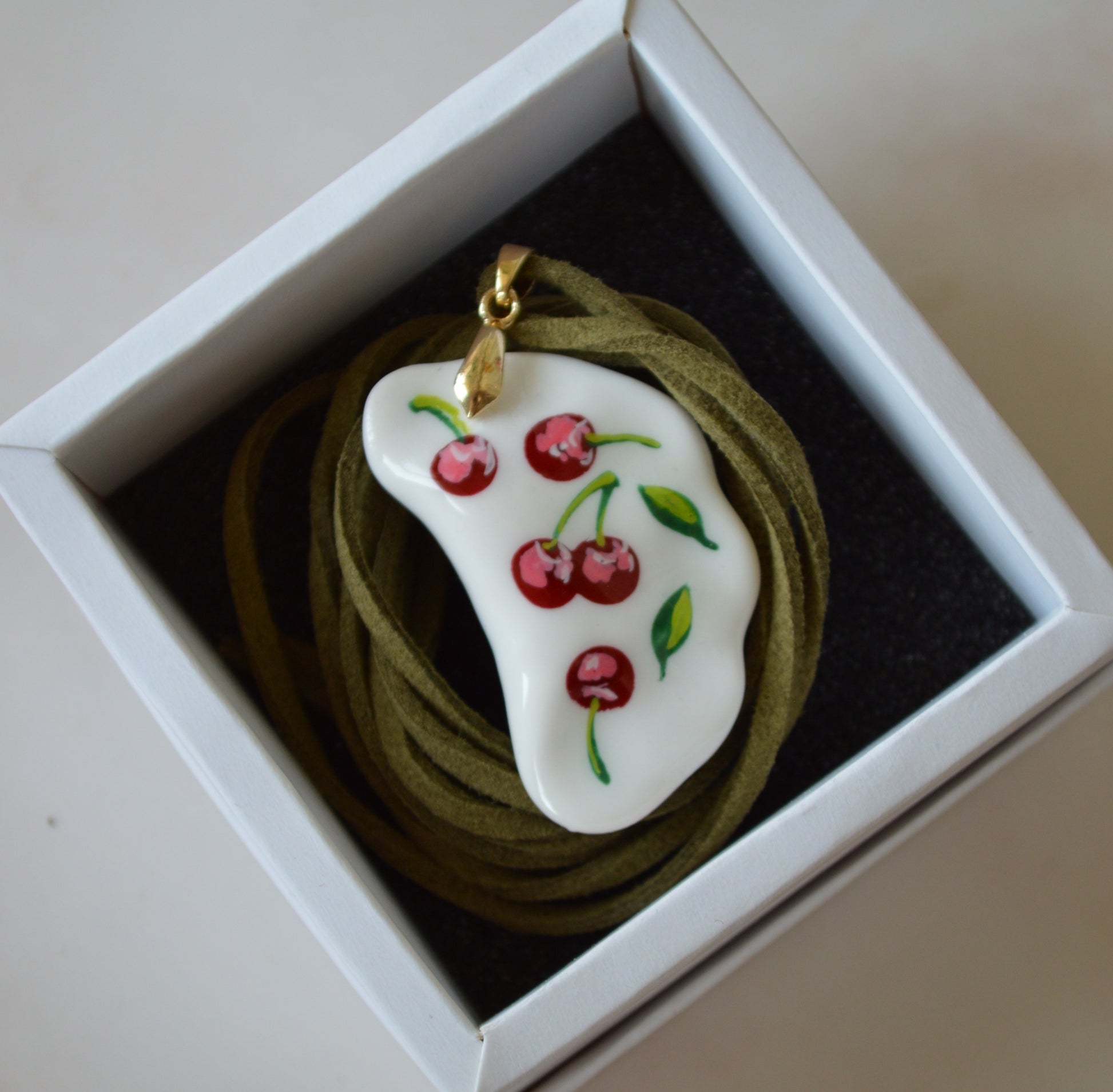 Pendant "Varenyk with cherry design"