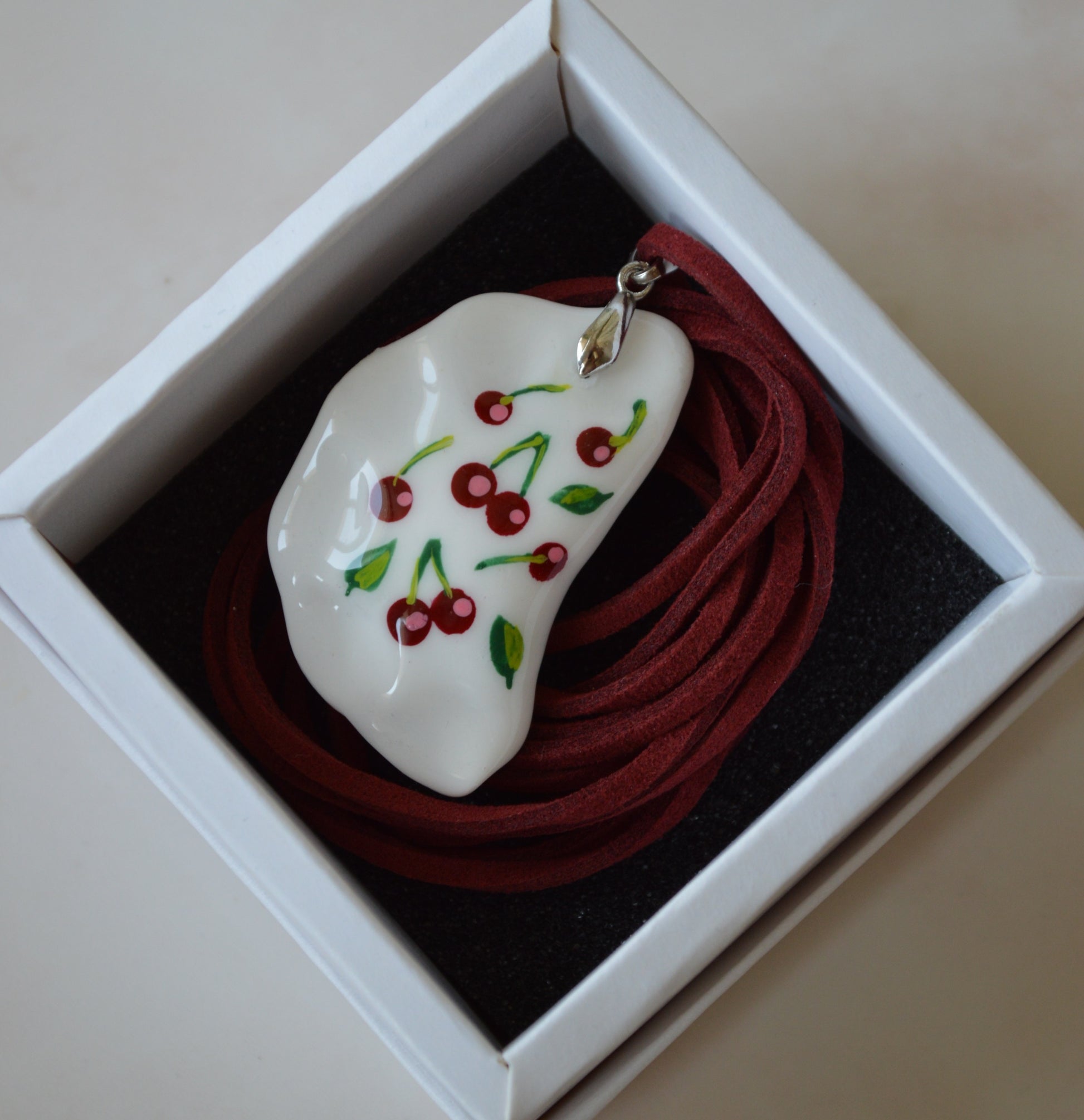 Pendant "Varenyk with cherry design"